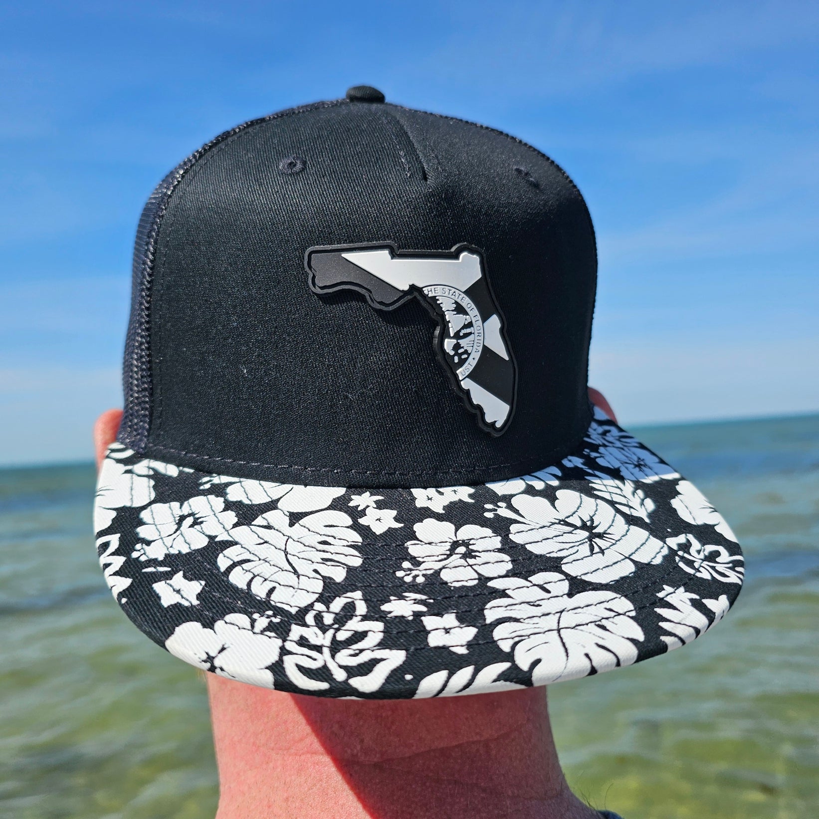 Florida Pride Trucker Hat on the Water